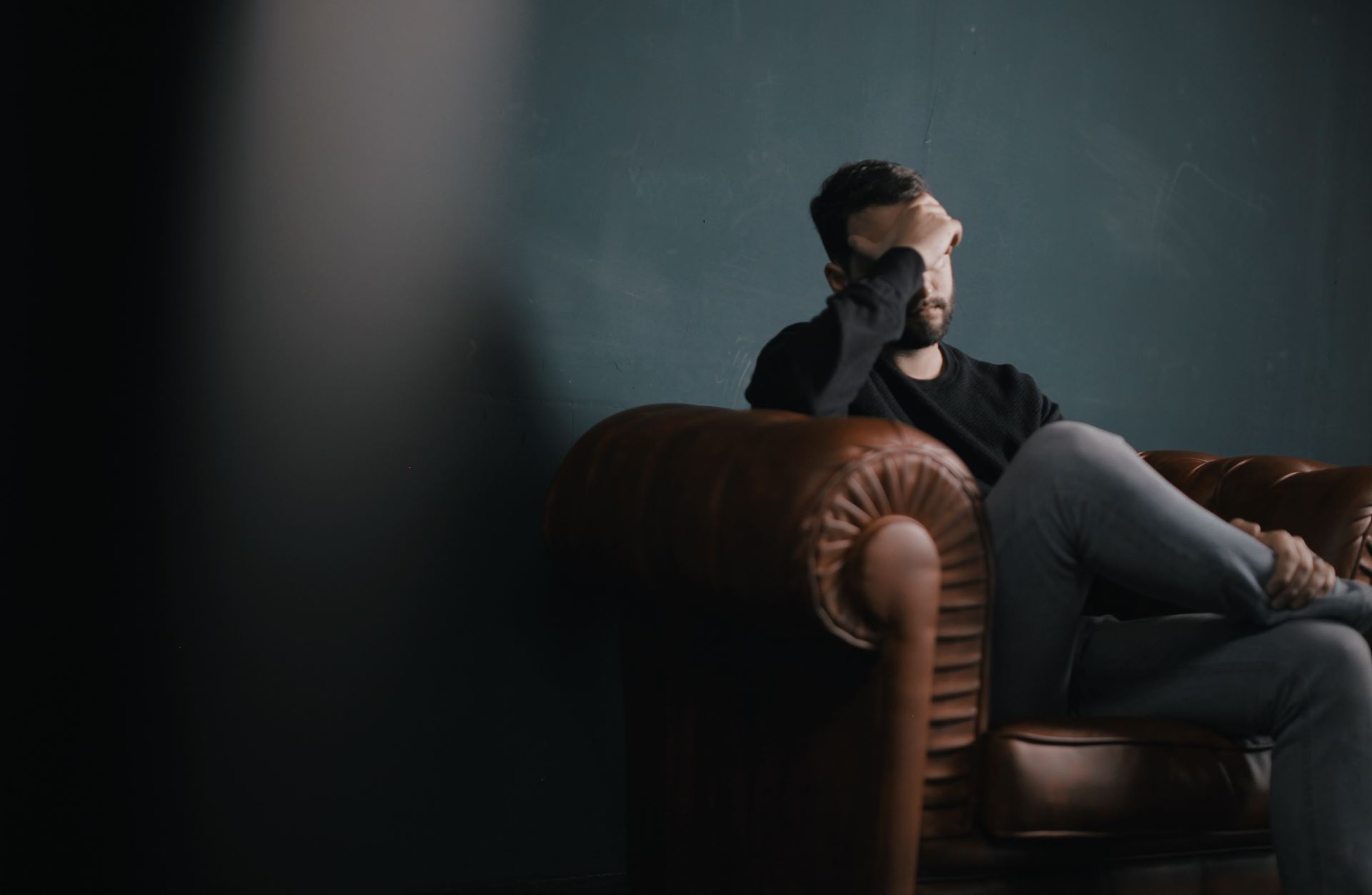 Man sitting on a sofa