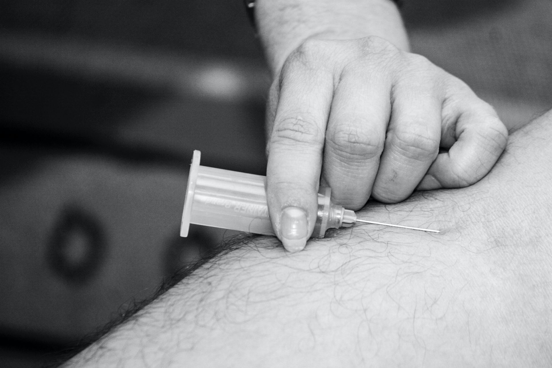Syringe in arm